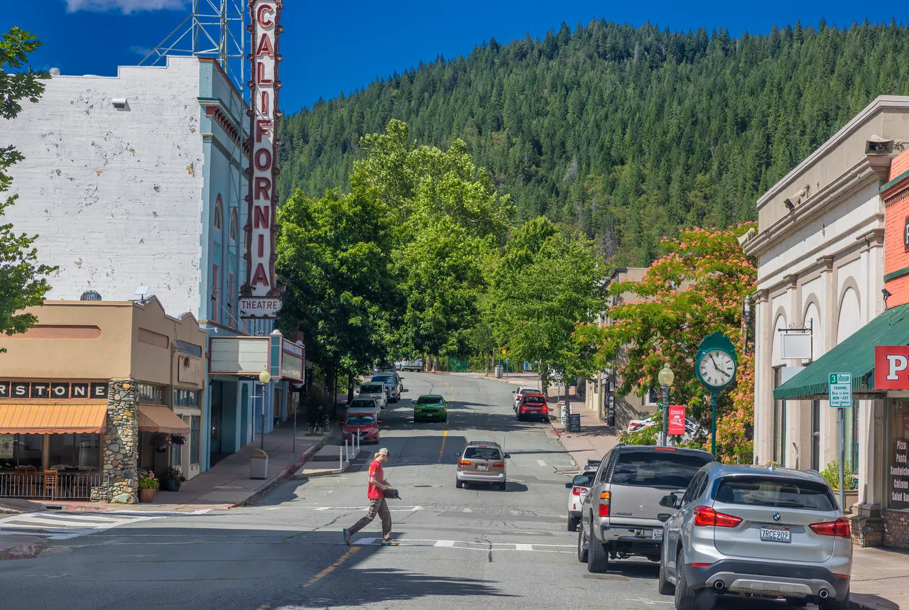 the California Theatre and a tree-lined street in downtown Dunsmuir